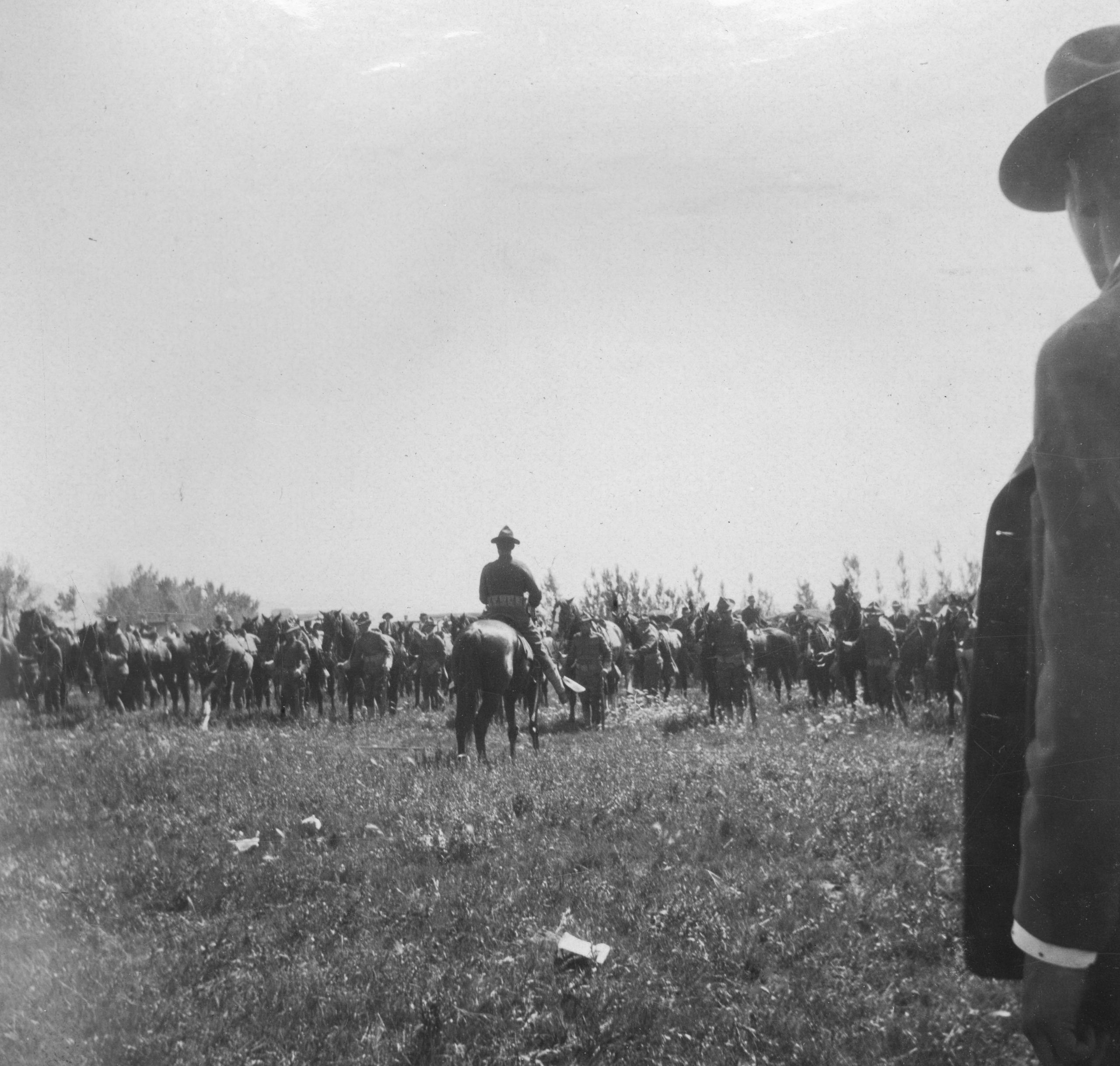 Soldiers with horses performing military drills at Fort Duchesne in 1910.