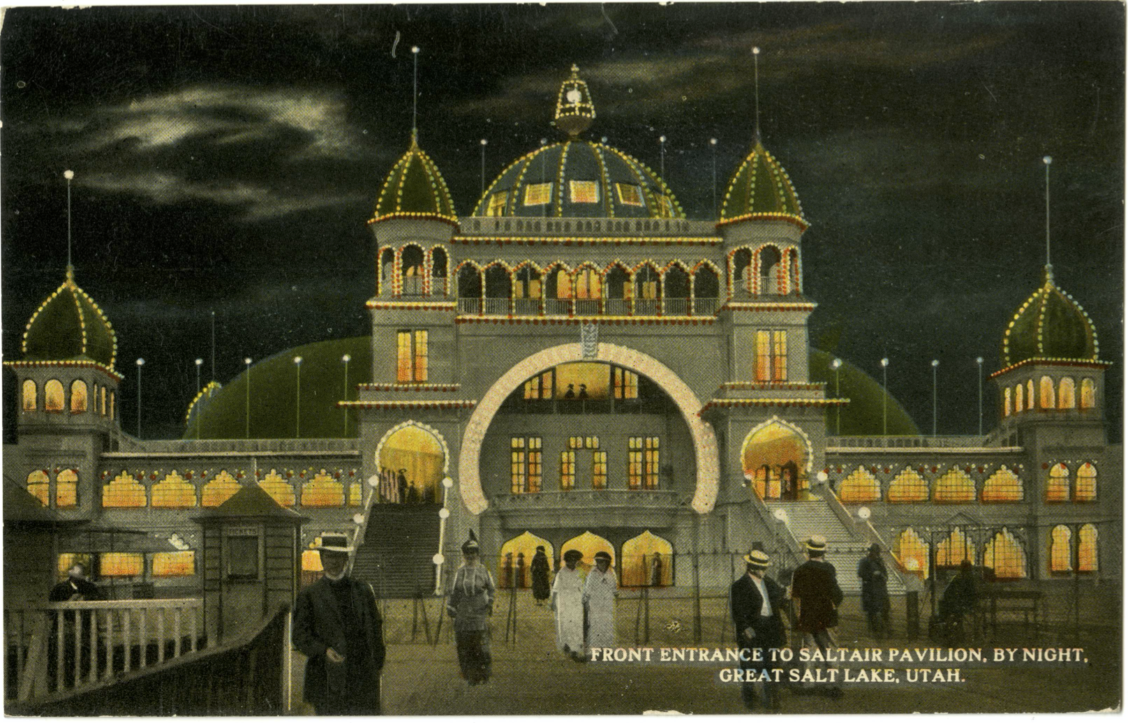 A souvenir postcard by Souvenir Novelty Company of a night scene of the lit up front entrance to the Saltair Pavilion on the Great Salt Lake.